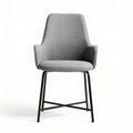 Gray upholstered chair with metal legs suitable for dining and office use